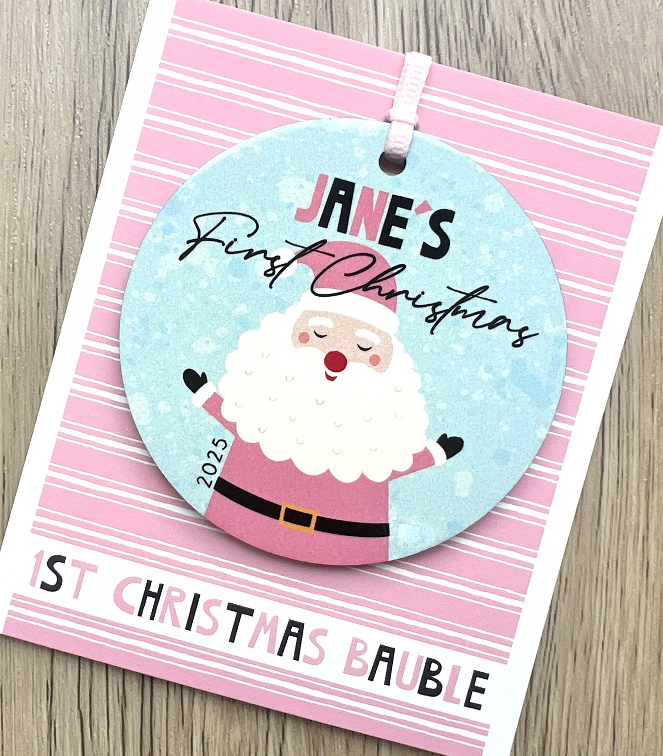 Personalised Father Christmas Wooden Baby Girls First Christmas Bauble, Gift